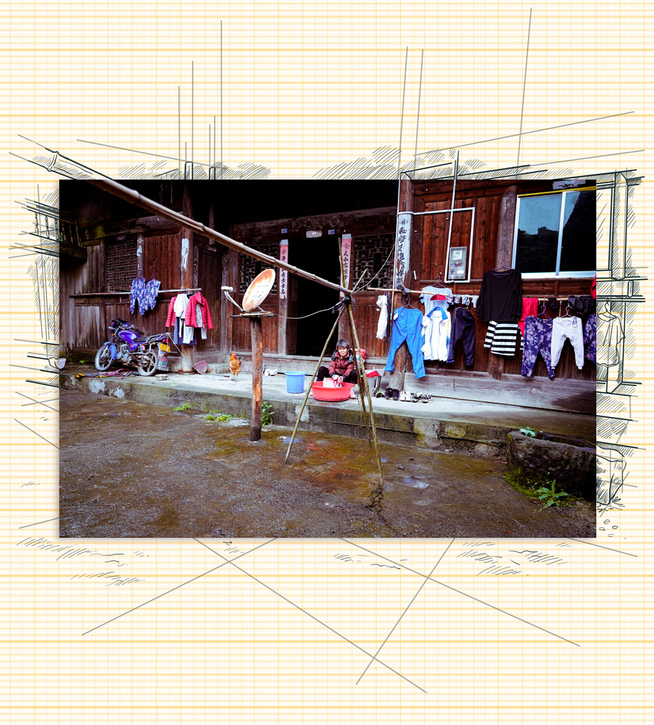 Grandma Peng Lanhua in her two-hundred-year-old home, renovated and serviced with electricity, running water, and satellite television in the village of Danyang, Guizhou Province, April 2021. Credit: Xiang Wang